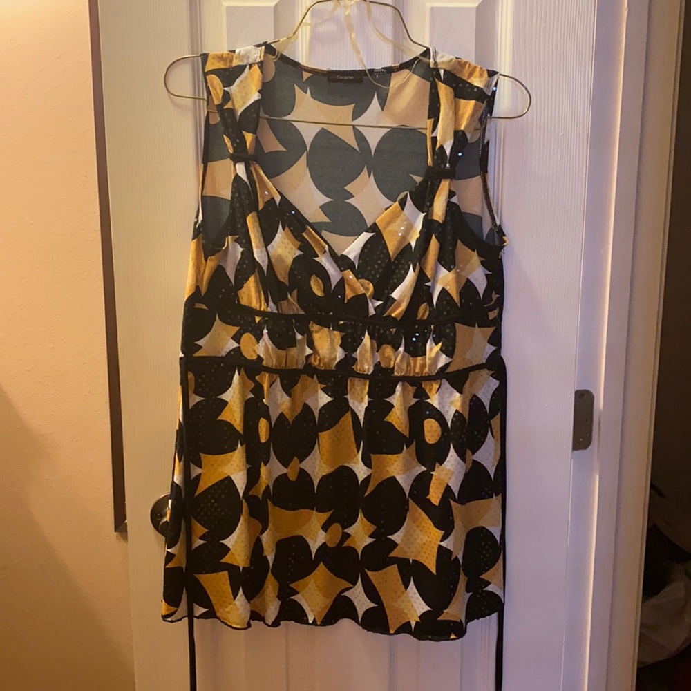 Maternity blouse color black gold yellow white.